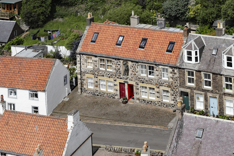 An aerial view of The Statue of Robinson Crusoe (Alexander Selkirk) in Lower Largo. Fife