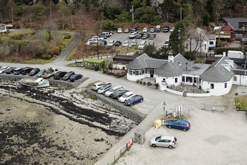 An aerial view of The Pierhouse Hotel, Port Appin, north of Oban, Argyll & Bute